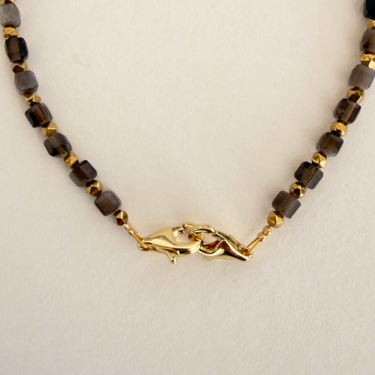Bracelet obsidienne, cubes facettés 4 mm & hématite dorée — RÉALISE Paris