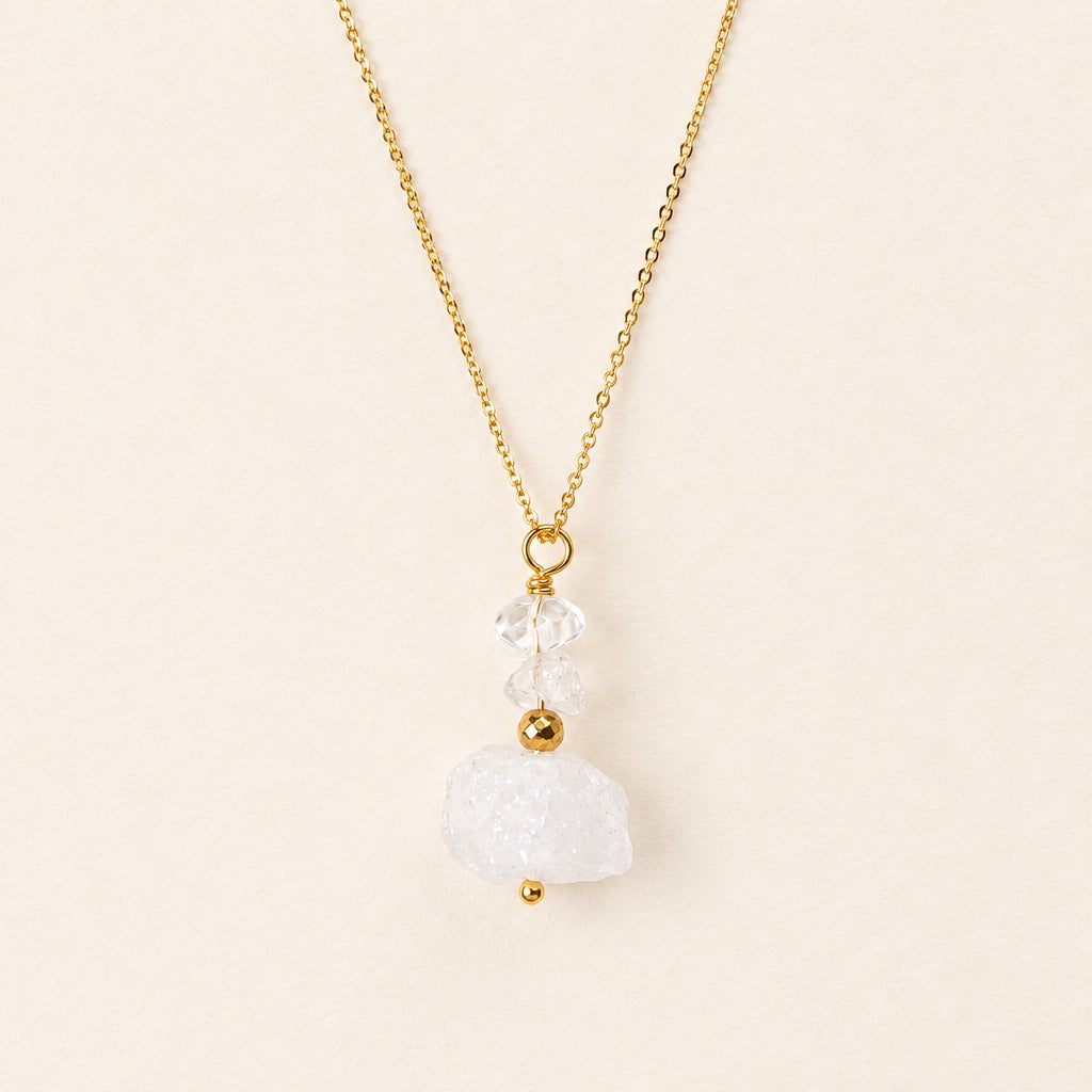 Collier pendentif cristal de roche brut & hématite dorée — chaîne plaquée or