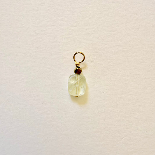 Green crystal charm — faceted rectangle